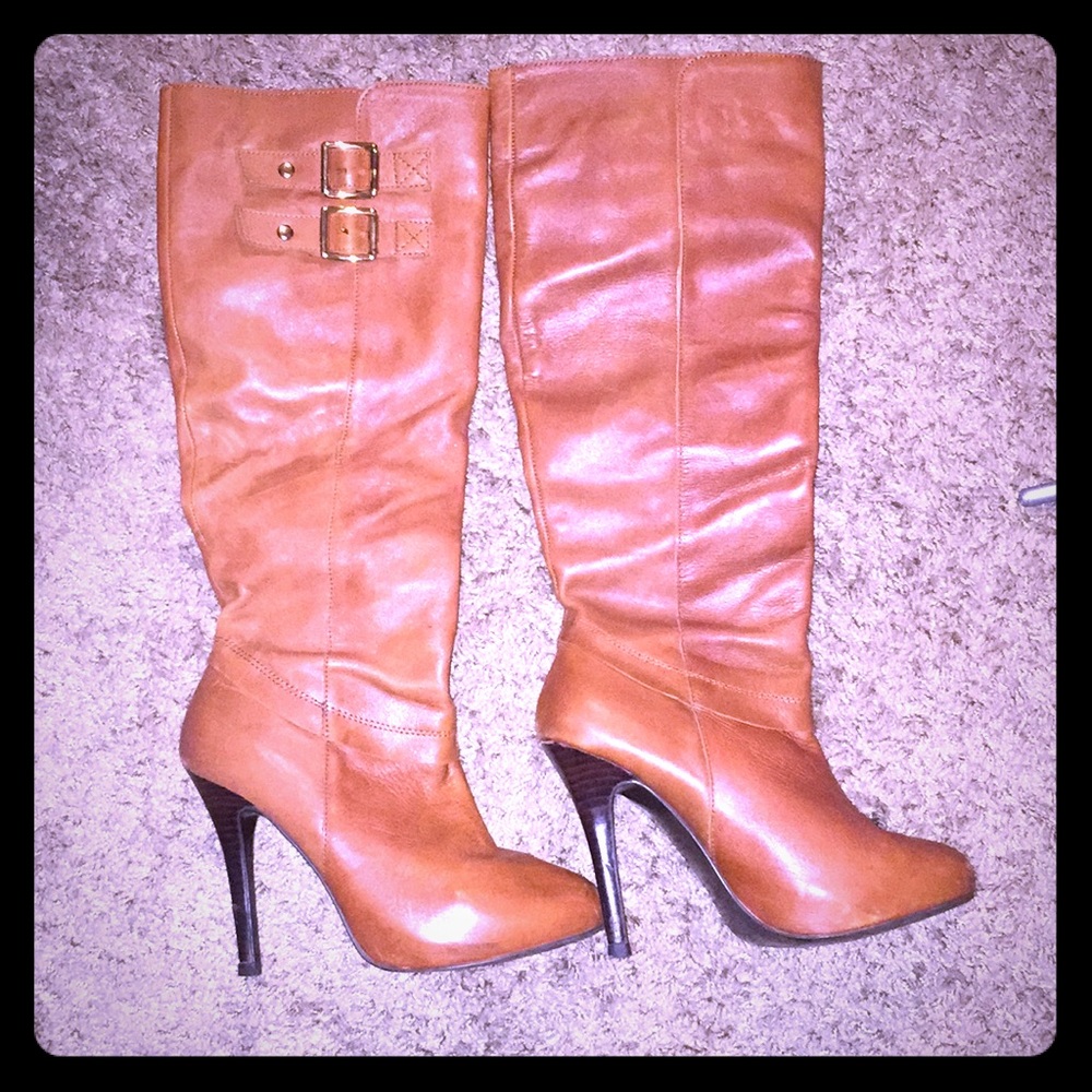 Brown boots up to knee